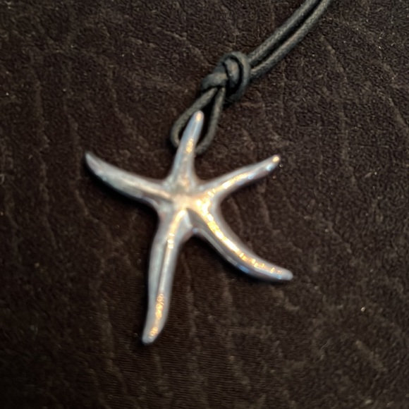 Sterling silver star pendent on black cord necklace. - Picture 2 of 5